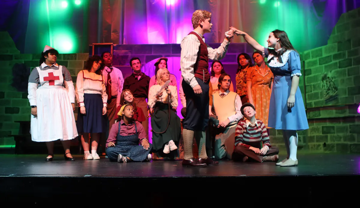 Student cast performing together on the Westerville South stage